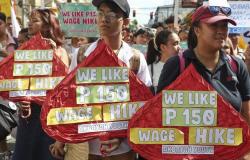Trabajadores y activistas en Asia y Europa piden más derechos laborales en las marchas del 1 de mayo –.