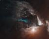 Hubble captura coro de luces cósmicas de un sistema estelar joven