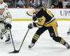 “Marchand corona el segundo gol de cuatro goles de los Bruins en la victoria por 6-4 sobre los Penguins -“.